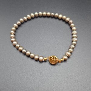 Silver/Goldtone Pearl Bracelet with Gold Accent. 8 Inch